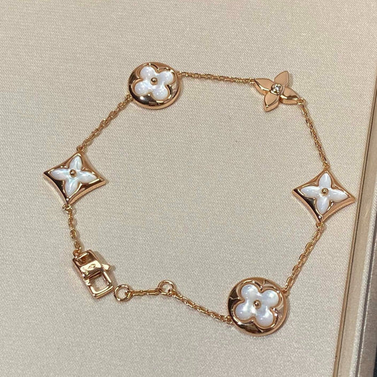 [Jesse jewelry]STAR AND SUN 5 MOTIF MOP PINK GOLD BRACELET